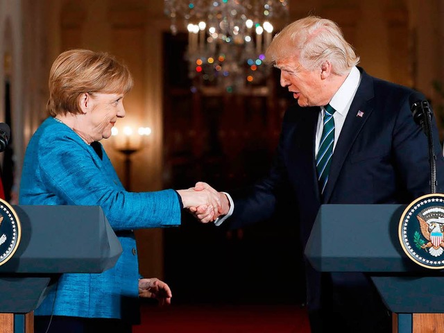 Bundeskanzlerin Angela Merkel und US-P...und Trump treffen sich zum ersten Mal.  | Foto: dpa