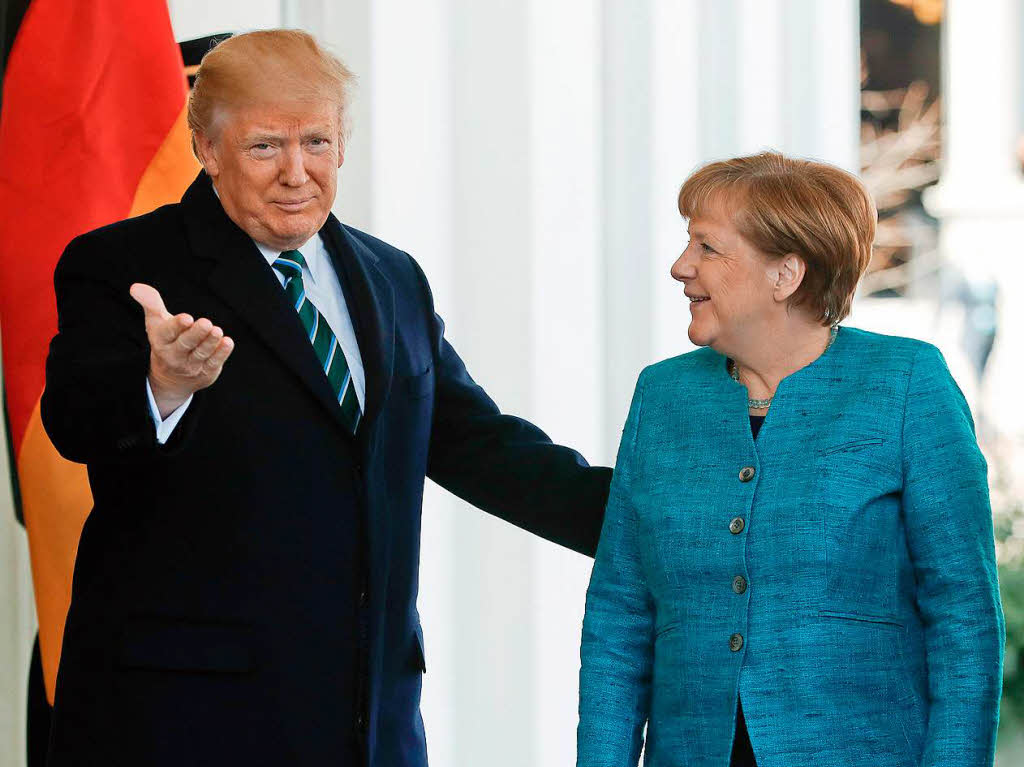 Fotos vom ersten Treffen zwischen Donald Trump und Angela Merkel.