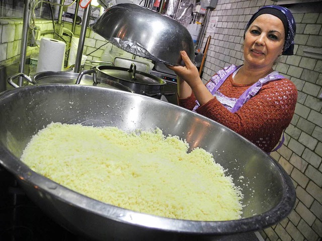 Habiba Hachemi aus Algerien kocht in d...taurant auf Staten Island in New York.  | Foto: dpa