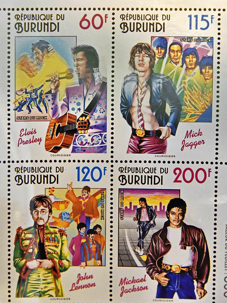 Burundi ehrte Elvis Presley, Mick Jager, Michael Jackson und John Lennon mit Briefmarken (von links oben im Uhrzeigersinn).