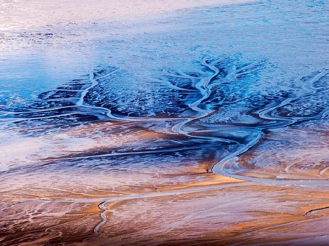 Die Gezeiten verndern die Landschaft ...enmeer bei der Nordseeinsel Helgoland   | Foto: dpa