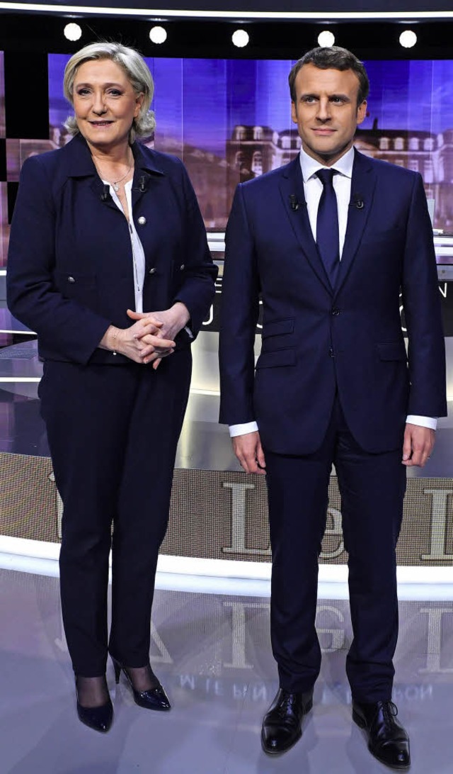 Erbitterte Kontrahenten: Marine Le Pen...mmanuel Macron vor ihrem Fernsehduell.  | Foto: dpa/Photo L&#8217;Alsace