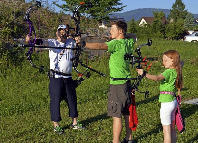 Drei Mitglieder der Weltmeisterfamilie...er, Philipp Bingemer und Peter Haack.   | Foto: SIL