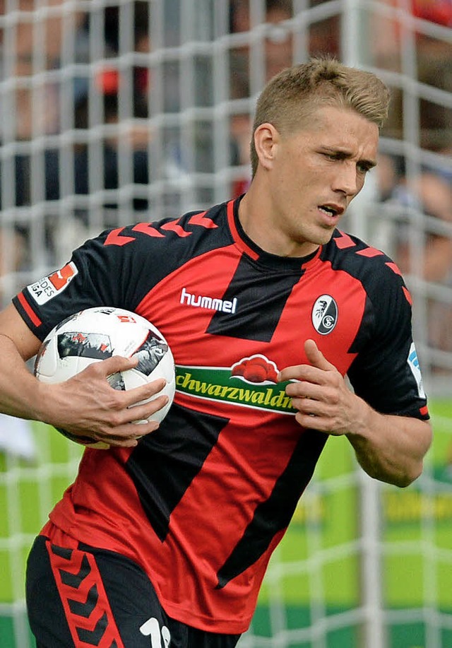 Spieler und Trainer, Sohn und Vater: Nils Petersen (links) und Andreas Petersen   | Foto: dpa/Bongarts