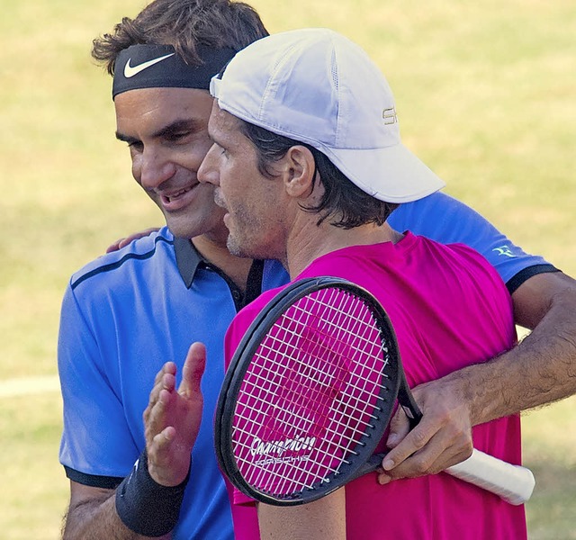 Federer (links) und Haas   | Foto: dpa