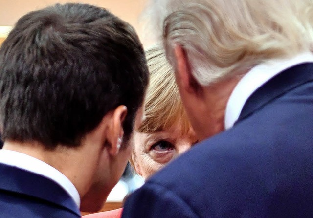 Emmanuel Macron, Angela Merkel und  Donald Trump in einem Sechs-Augen-Gesprch   | Foto: AFP