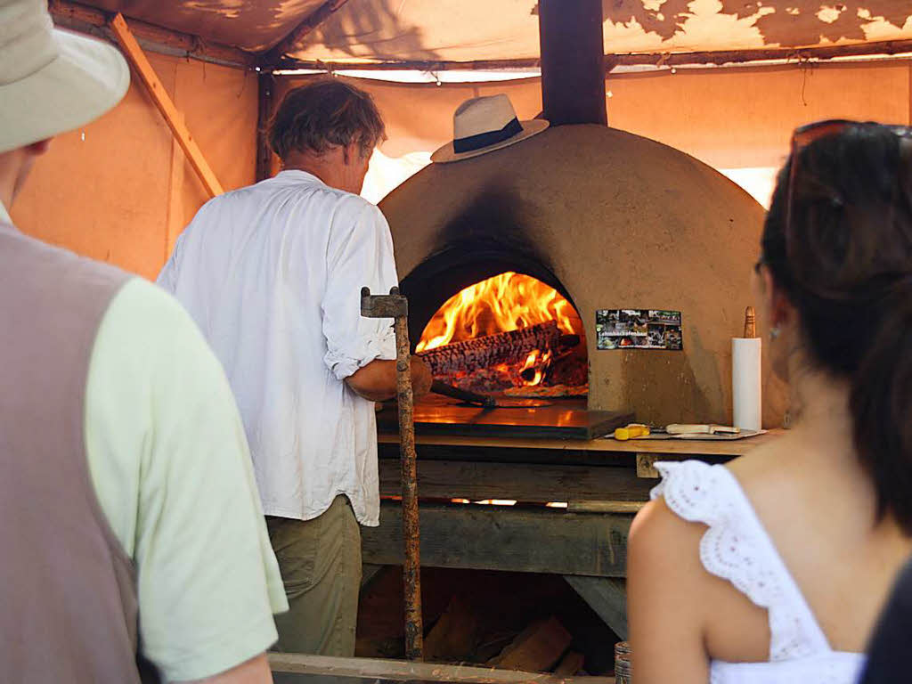 Harter Job: Flammenkuchenbacken bei 30 Grad im Schatten