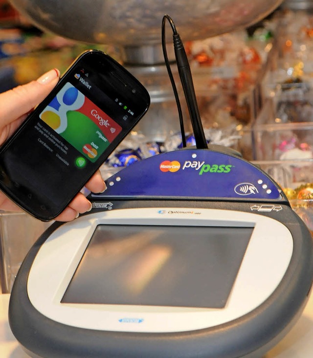 Mit dem Handy bezahlen  | Foto: Google/dpa