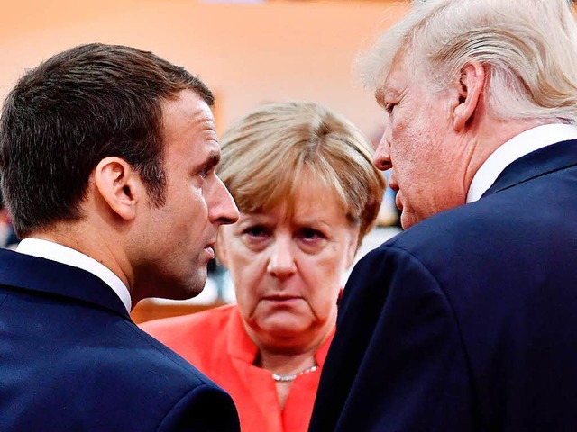 Macron und Trump sind gerade erst beim...1; hier im Gesprch mit der Kanzlerin.  | Foto: AFP