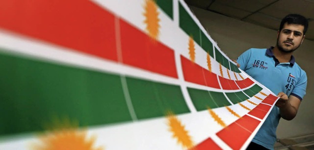 Vorbereitungen fr die Unabhngigkeit:...aggen der Autonomen Region Kurdistan.   | Foto: AFP