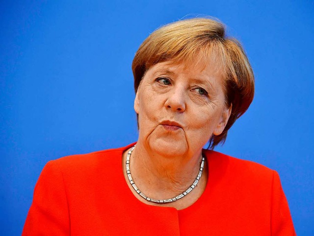 Gut gelaunt bei der Sommerpressekonferenz: Kanzlerin Angela Merkel  | Foto: AFP