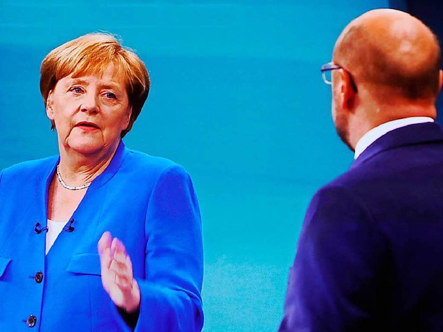 Kanzlerin Angela Merkel und SPD-Herausforderer Martin Schulz  | Foto: dpa