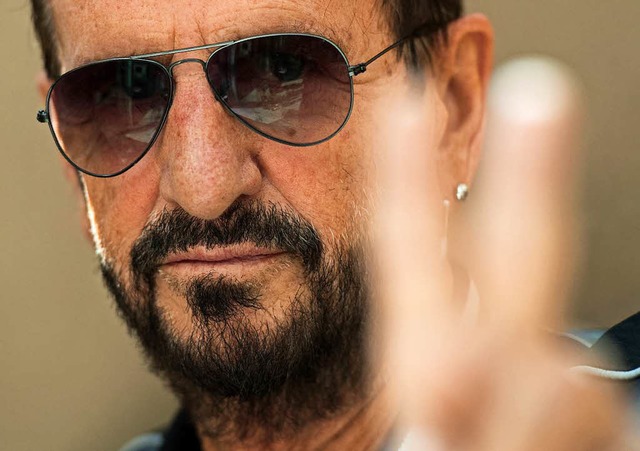 Friedensbewegter Schlagzeuger und Ex-Beatle: Ringo Starr  | Foto: CHRIS J RATCLIFFE