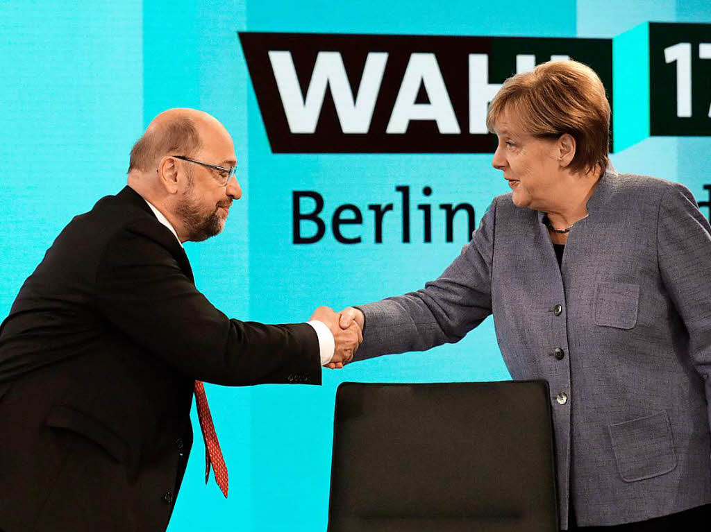 Shakehands: Martin Schulz und Angela Merkel.