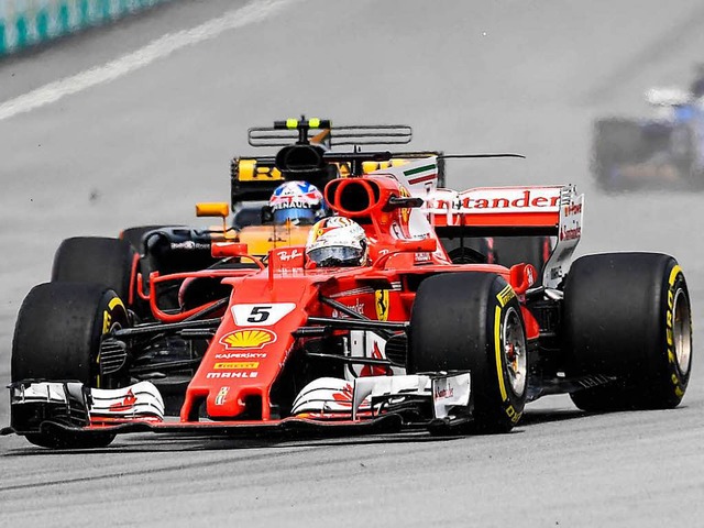 Ferrari-Pilot Sebastian Vettel bei  seiner rasanten Aufholjagd.  | Foto: afp