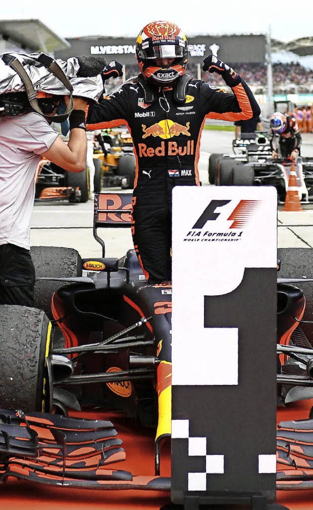 Strammer Max: Am Tag nach seinem 20. G...pen das  Formel-1-Rennen in Malaysia.   | Foto: AFP