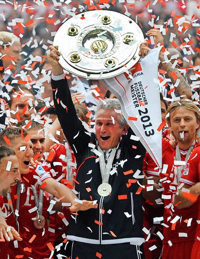 Da war die Bayernwelt aber sowas von h...oli Timoschtschuk (rechts) das Triple.  | Foto: dpa