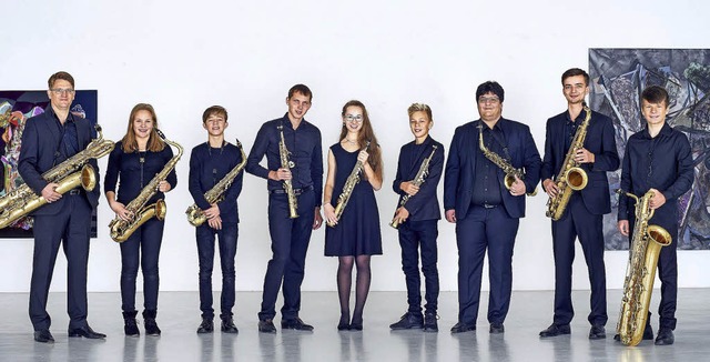 Eine groe Saxophon-Familie: Christoph...) und das Freiburger Saxophonensemble   | Foto: pro