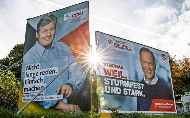 Rivalen auf Wahlplakaten: CDU-Herausfo...nn, SPD-Ministerprsident Stephan Weil  | Foto: dpa