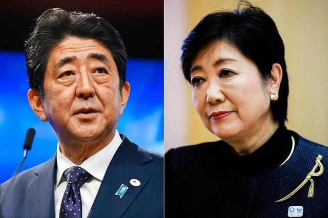 Japans Premierminister Shinzo Abe und seine Herausforderin Yuriko Koike.  | Foto: AFP