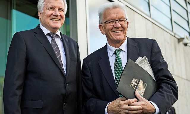 Sind in verschiedenen Parteien, sollen...ofer (links) und Winfried Kretschmann.  | Foto:  DPA