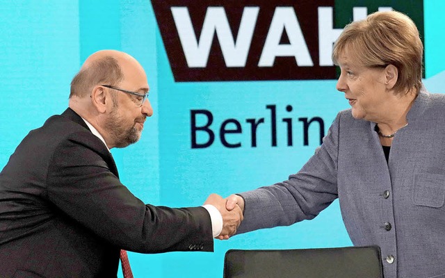 Reichen sich Martin Schulz und Angela ...r die Hand? Die Chancen dafr steigen.  | Foto:  DPA
