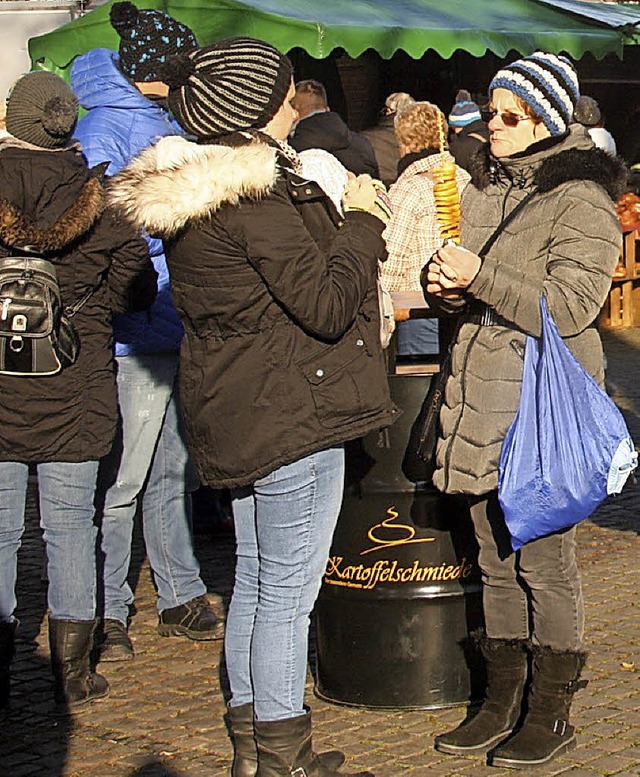 Glhweinduft, Tannenzweige, eine Eisen...her am Samstag beim Christkindlemarkt.  | Foto: Hans Jrgen Kugler