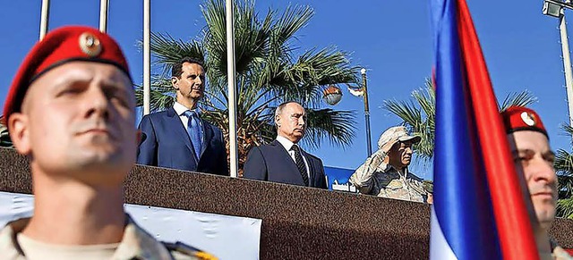 Der russische Prsident  Vladimir Puti...syrischer Amtskollege Baschar al-Assad  | Foto: AFP