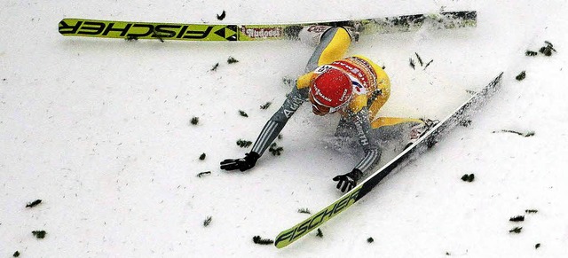 Rechtes Skiende auf das linke gelegt u...deutsche Skispringer Richard Freitag    | Foto: AFP