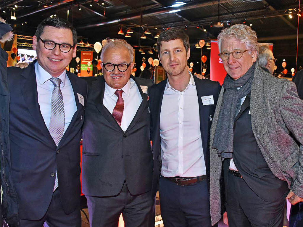 Die SC-Spitze Oliver Leki, Fritz Keller und Jochen Saier mit Reporter-Legende Marcel Reif (von links)
