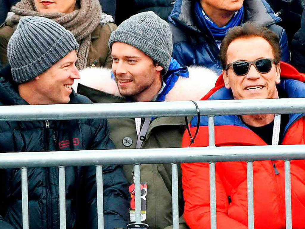 Unter den Zuschauern in Kitzbühel: Arnold Schwarzenegger (rechts). Unter den Zuschauern in Kitzbühel: Arnold Schwarzenegger (rechts).