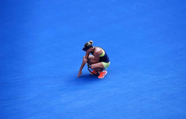 Angelique Kerber im Spiele gegen die Rumnin Simona Halep  | Foto: AFP