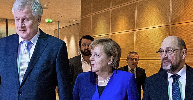 Es geht weiter: Horst Seehofer, Angela Merkel und und Martin Schulz  | Foto: dpa