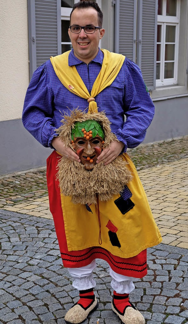 Zunftmeister Dirk Zimmermann im Hs de...r und mit der Maske der Driebelbisser.  | Foto: Martin Pfefferle