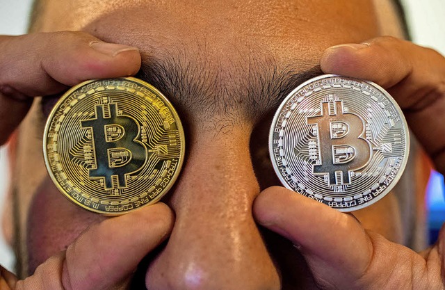 Der Bitcoin-Rausch hat blind gemacht fr einen irrsinnigen Energieverbrauch.  | Foto:  AFP