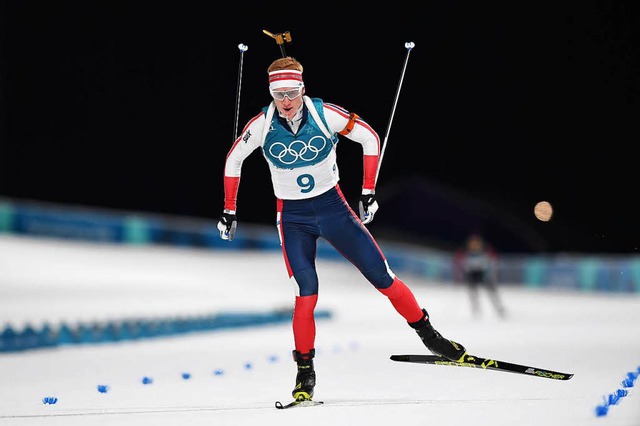 Gold ber 20 Kilometer trotz zweier Schiefehler: Johannes Thingnes B  | Foto: AFP