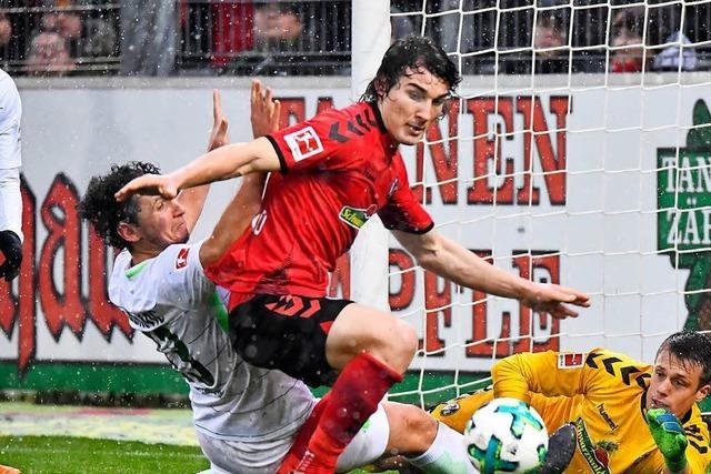 Fotos: SC Freiburg gewinnt im Schneeregen gegen Werder Bremen