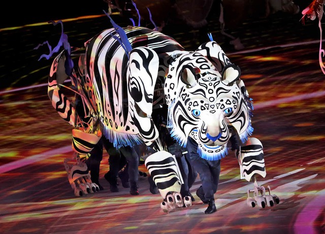 Beschtzer der Menschen: der Tiger bei...rffnungsfeier der Olympischen Spiele   | Foto: dpa