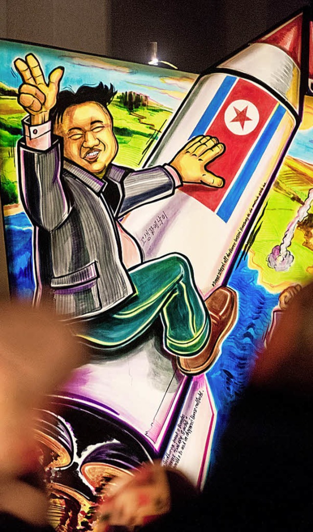 Eine Grolaterne mit  Nordkoreas Machthaber Kim Jong   | Foto: Seeger