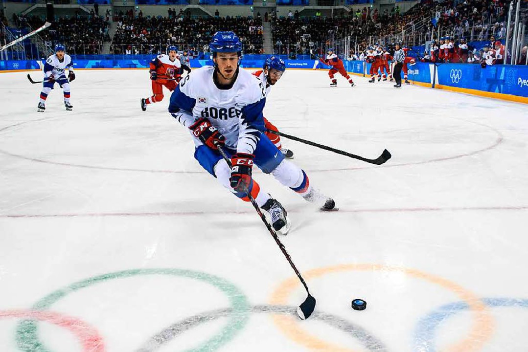 Unterwegs auf olympischem Eis: Der geb...ss der koreanischen Nationalmannschaft  | Foto: AFP