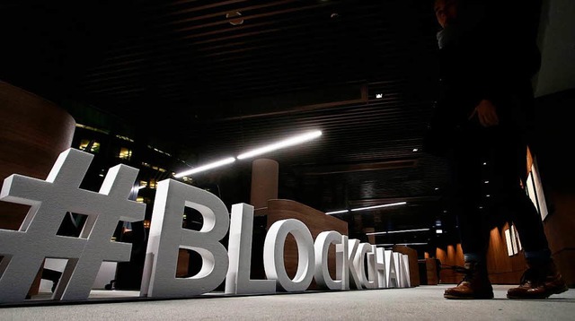 Was ist eine Blockchain?  Diese Frage ...der Badischen Zeitung im Hrsaal 1010.  | Foto: AFP