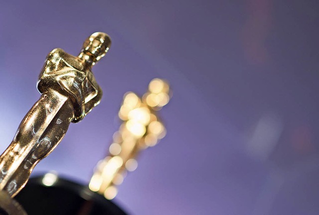 Warten auf ihre Gewinner: die Oscars-Statuen   | Foto:  dpa