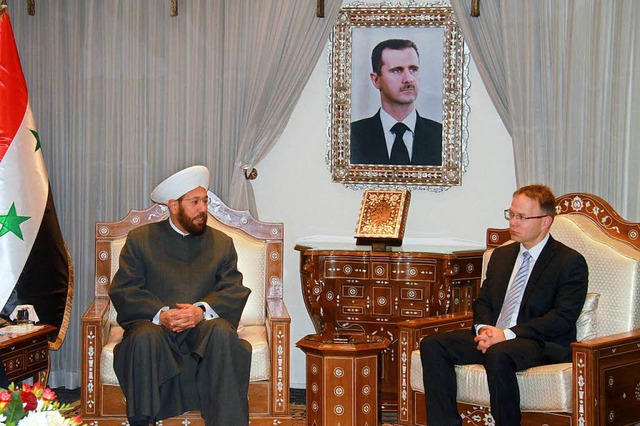 Der syrische Gro-Mufti Ahmad Badreddin und Christian Blex  | Foto: AFP