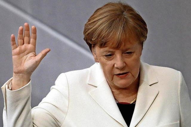 Angela Merkel mit knapper Mehrheit wieder Kanzlerin