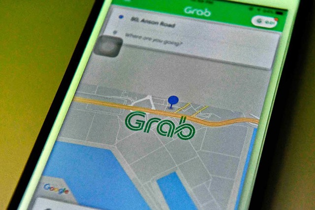 Uber berlasst den sdostasiatischen Markt dem Konkurrenten Grab.  | Foto: AFP