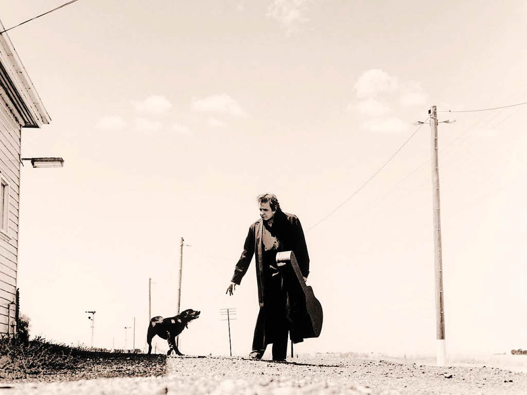 Auch Johnny Cash – hier ein Bild aus dem Fotoband von Andy Earl, erschienen im Schwarzkopf & Schwarzkopf Verlag, gilt als Gibson-Fan.