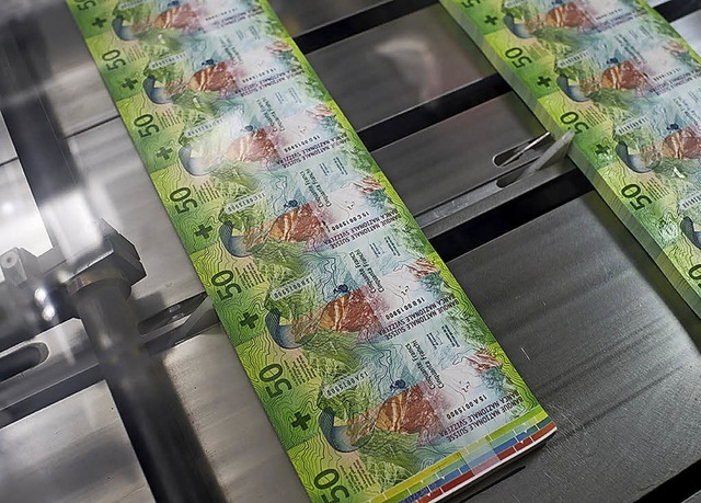 Sichtbares und unsichtbares Geld. Rund...t quasi nur in den Bchern der Banken.  | Foto:  ZVG/Schweizerische Nationalbank