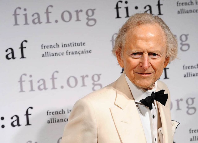 Markenzeichen weier Anzug und Fliege: Tom Wolfe (2012)  | Foto: AFP