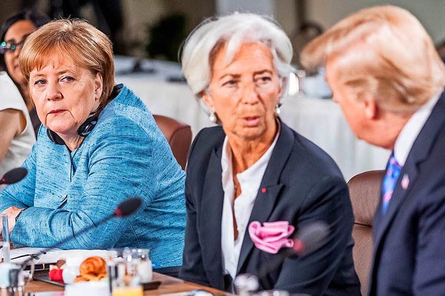 Angela Merkel (.l) neben Christine Lagarde und Donald Trump.  | Foto: dpa