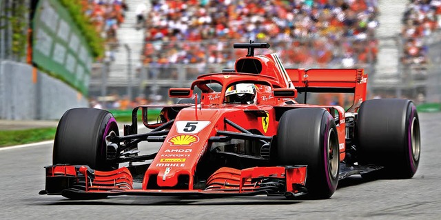 Sebastian Vettel war in Kanada in seinem roten Flitzer nicht zu besiegen.    | Foto: AFP